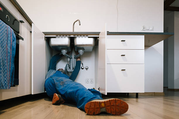 Professional Plumbing technician working in Post Falls, ID